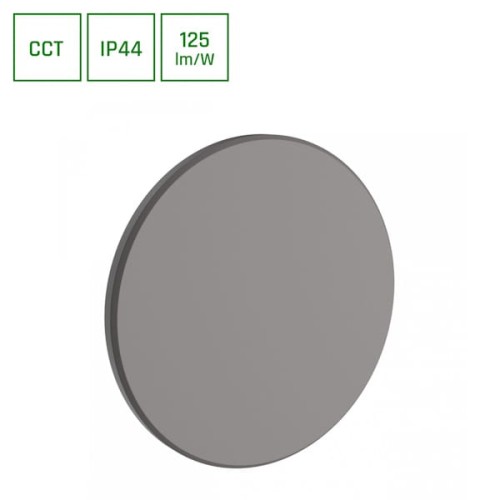 Okrągła oprawa PIATTA 12W w kolorze szarym, o średnicy 180 mm i grubości 47 mm. Posiada klasę ochrony IP44. Widoczny jest jedynie gładki front oprawy, bez dodatkowych zdobień czy napisów.
