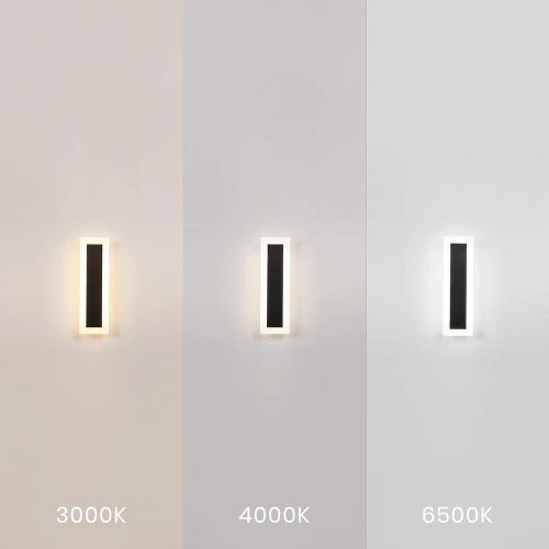 Kinkiet elewacyjny WOW 60 cm z oprawą ścienną, z możliwością zmiany barwy światła (3000K, 4000K, 6500K). Zainstalowany na jasnej ścianie, o prostokątnym kształcie z czarnym wypełnieniem i białą ramką. Wodoodporność IP54.