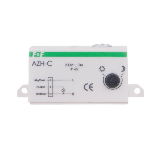 Automat zmierzchowy F&F AZH-C, biały, prostokątny kształt. Widoczne oznaczenia: model AZH-C, napięcie 230V, 10A, IP 65. Przycisk regulacji z symbolem słońca i księżyca, trzy zaciski oznaczone kolorami: brązowy, czarny, niebieski.