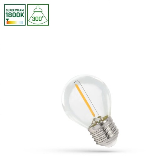 Żarówka LED filament kulka E27 1W, ciepła biała 1800K. Przezroczysta bańka z widocznym filamentem w kształcie linii. Urokliwy, klasyczny kształt, z metalowym gwintem E27, przeznaczona do oświetlenia wnętrz. Kąt świecenia 300°.