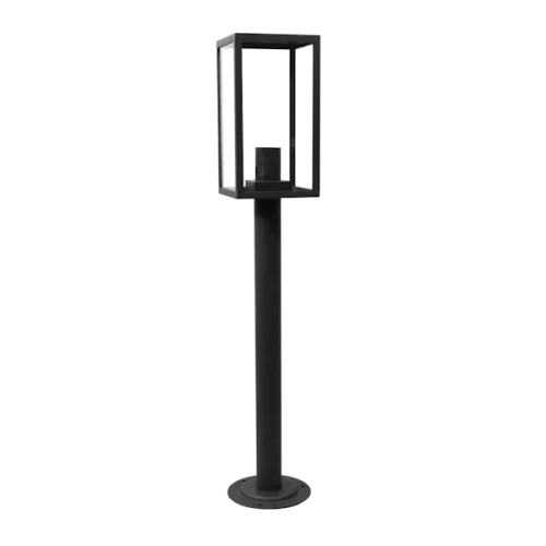 Lampa ogrodowa słupek MALMO E27 o wysokości 68 cm w kolorze grafitowym. Posiada prostą, geometryczną konstrukcję z metalowym stelażem i szklanym kloszem. Ujęcie frontalne, lampa stoi na okrągłej podstawie.