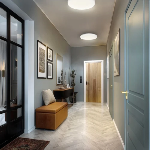 Lampa sufitowa plafon NYMPHEA w białym kolorze, z matową powierzchnią, zamontowana w korytarzu. Zauważalne okrągłe kształty i subtelne oświetlenie, pasujące do nowoczesnego wystroju wnętrza. Widoczna drewniana drzwi i stylowe dodatki.