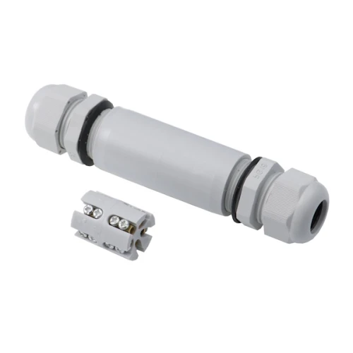 Złącze kablowe SP 2,5 5x2,5/PG16 w kolorze szarym, w formie cylindrycznej, z dwiema nakrętkami po obu stronach. Obok widoczny fragment złączki z pięcioma stykami. Produkt leży na prostym tle.