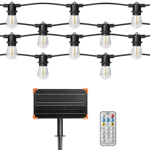 Zestaw 3 żarówek LED filament E27 0,1W w ciepłej białej barwie. Żarówki mają przezroczyste klosze, zamontowane na czarnych kablach. Obok widoczny panel solarny oraz pilot zdalnego sterowania. Idealne do dekoracji wnętrz i ogrodów.