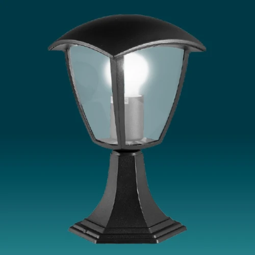 Lampa ogrodowa słupek WENA E27, wysoka na 30 cm, z czarną metalową podstawą i przezroczystymi ściankami. Okrągły klosz z dachem w kształcie parasola. Wewnątrz widoczna żarówka LED. Idealna do oświetlenia ogrodu lub ścieżek.