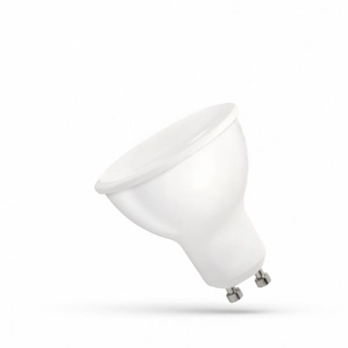 Żarówka LED GU10 6W w kolorze zimnej białej, o okrągłej, lekko zwężającej się ku dołowi obudowie. Posiada dwa metalowe styki na końcu, umieszczona na jednolitym tle.